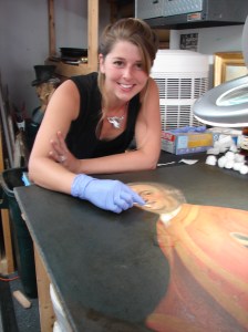 Traci Lindholm Nee (seen here) and Ron Lindholm (not shown) have more than fifty years combined experience working with oil painting conservation.